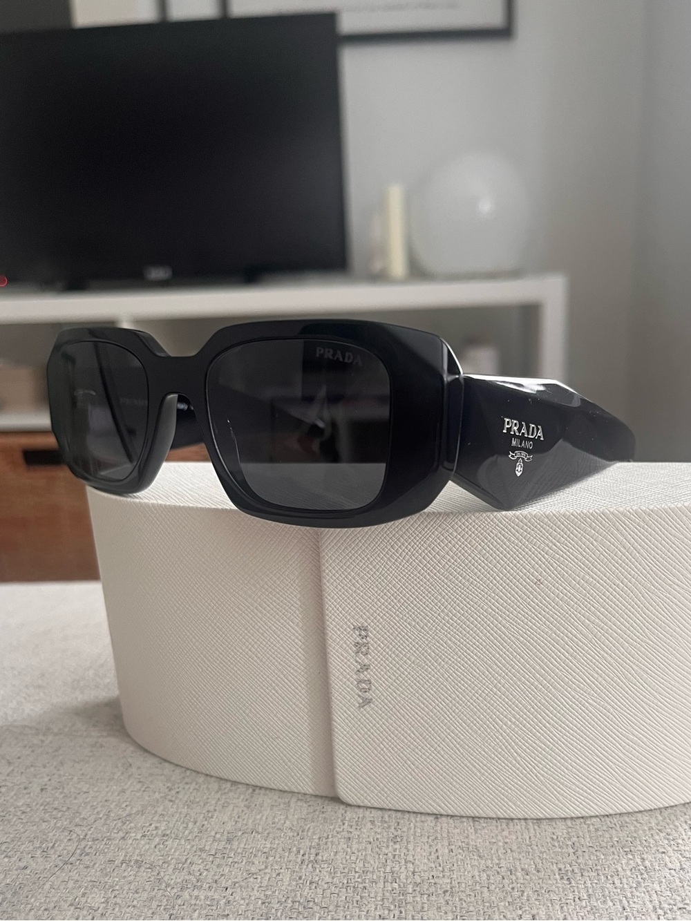 Prada Women’s Black Rectangular Sunglasses with Dark Lenses